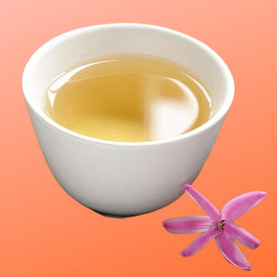 white tea on orange background