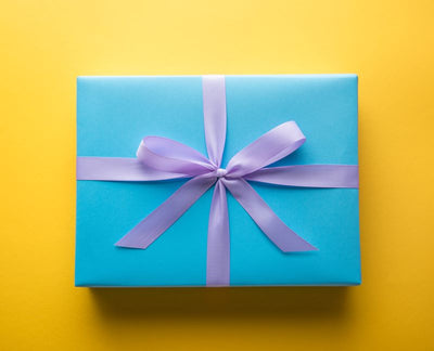 wrapped gift yellow background