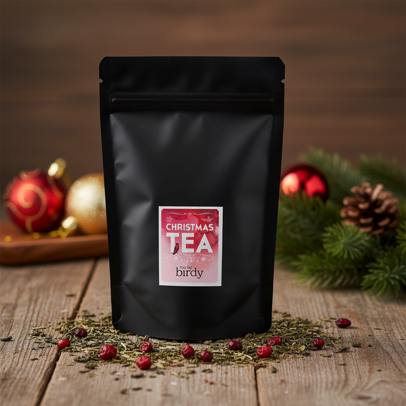christmas green  tea package with a label on a white background