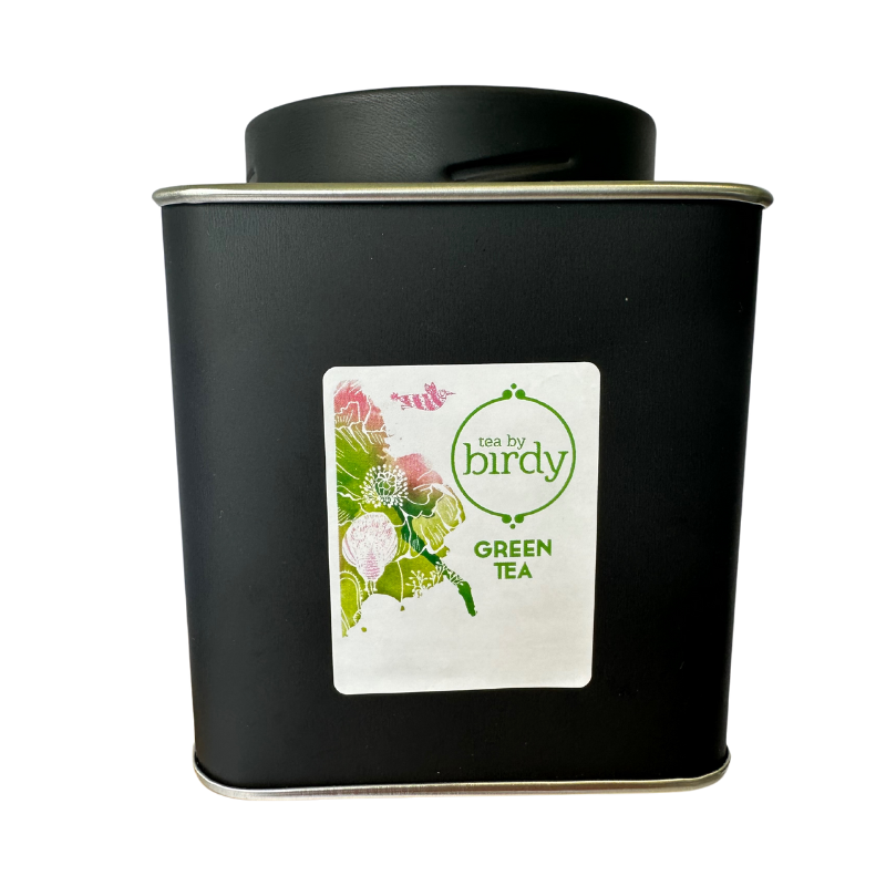 green tea in black 
tin
