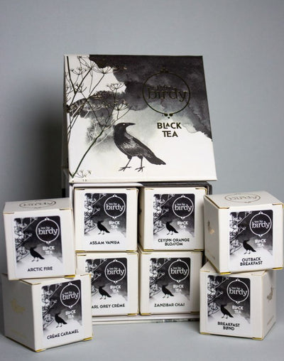Black tea collection box with mini cubes of tea