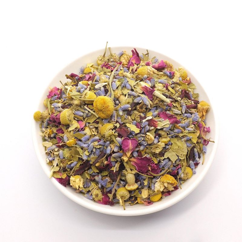 Organic sleepy health tea in a bowl.  Chamomile, passionflower, hibiscus, lavender